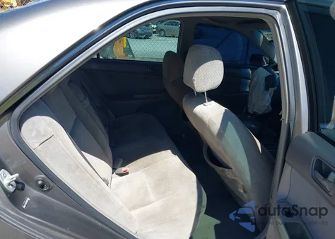 2004 Toyota Camry Le from USA, damaged, VIN 4T1BE32K64U870310